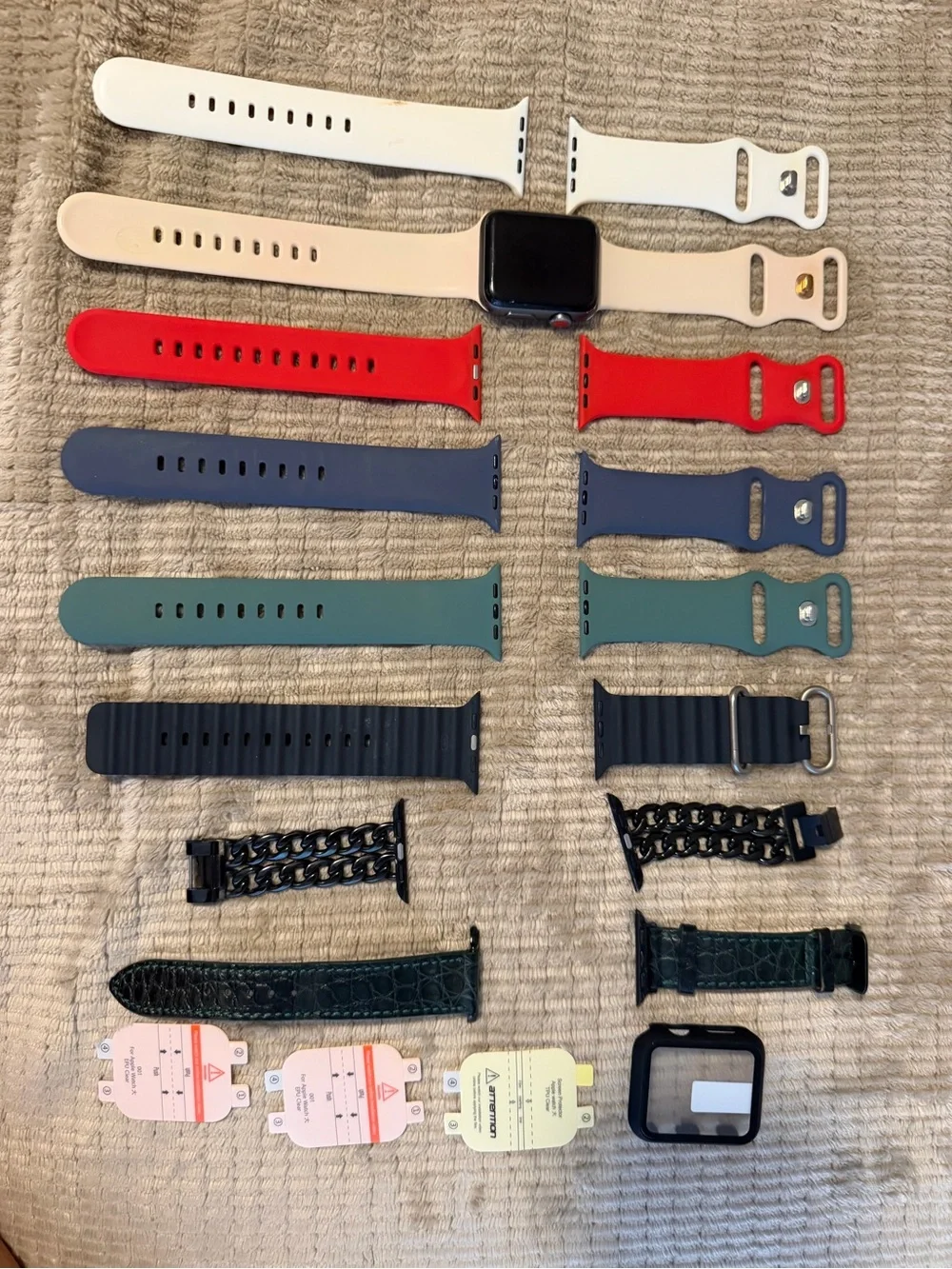 Apple Smartwatch with White, Red, and Blue Sport Bands